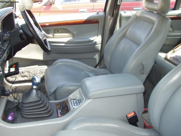 Leather seats, door trims. Power windows, 5 speed manual. :-)