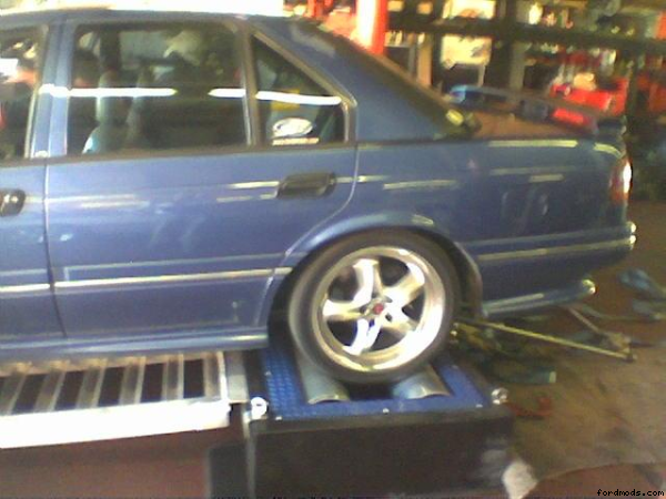 rear shot of me car on the dyno