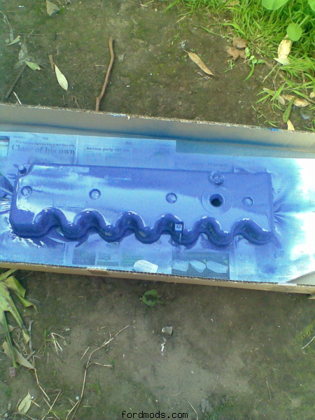 rocker cover midway through painting