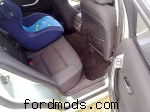 back seat.  damn grubby.