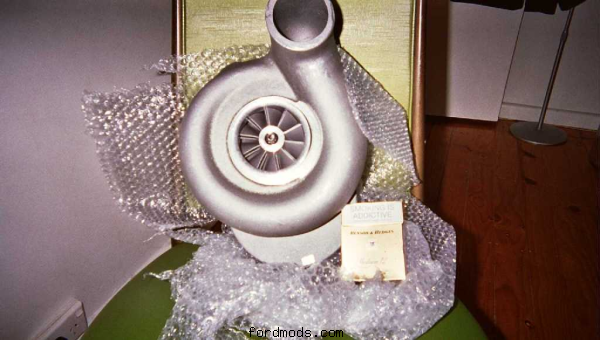 Supercharger with smokes for scale
