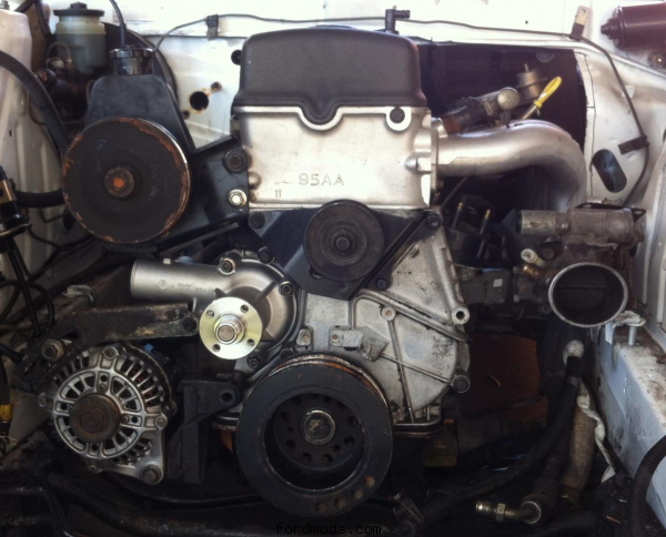 I had to cut the firewall to fit the ford engine in.